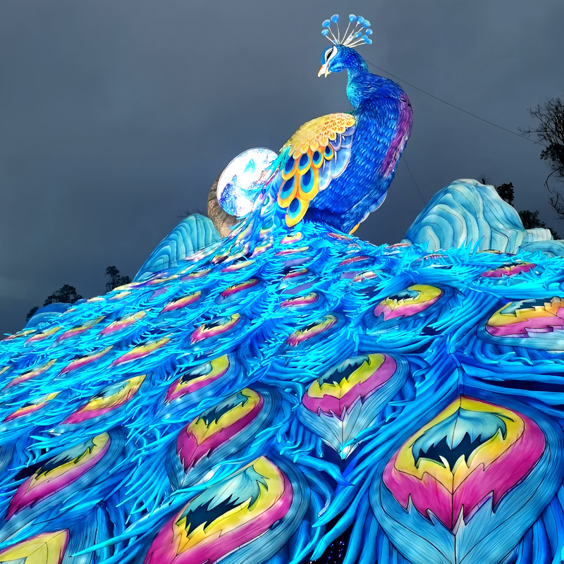 Custom Giant Peacock Zigong Lantern, Large Peacock Spreading Tail Silk Light Sculpture with Mountain & Moon Backdrop, Waterproof Outdoor Festival Light Exhibition