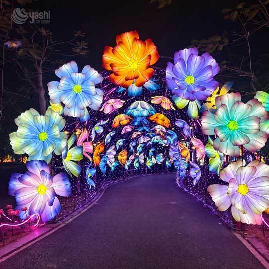 Sendero de Linterna del Jardín Encantado, Instalación de Linterna LED Gigante de Lirio, Tulipán, Hongo y Mariposa para Festival Nocturno en el Parque